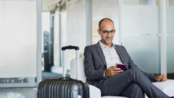 business traveler sitting in airport