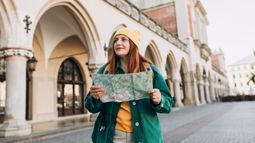 traveler with map in Krakow