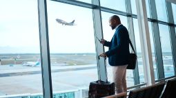 traveler in airport waiting for flight